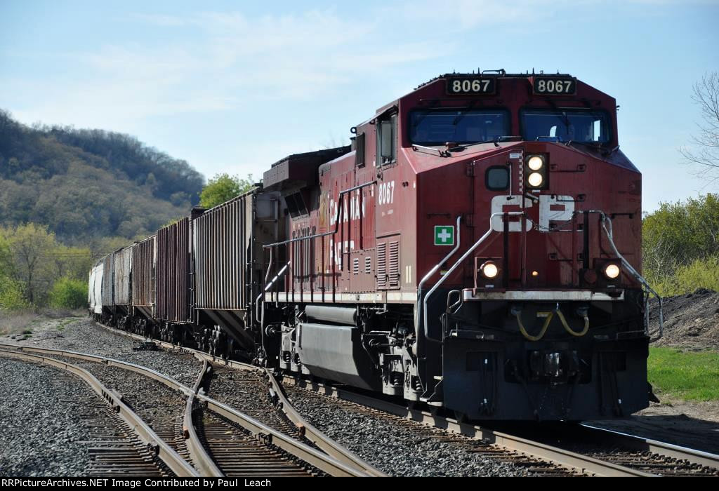 Grain train rolls east